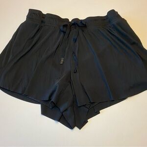 Women's Black Joy Lab athletic shorts with little short skirt on top.